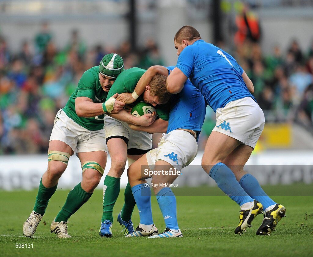 25 February 2012; Keith Earls supported by Sean O'Brien, Ireland, is tackled by Tobias Botes and Michele Rizzo, Italy. RBS Six Nations Rugby Championship, Ireland v Italy, Aviva Stadium, Lansdowne Road, Dublin. Picture credit: Ray McManus / SPORTSFILE