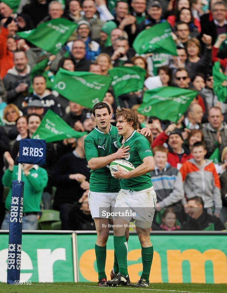 25 February 2012; Ireland's Andrew Trimble is congratulated by team-mate Jonathan Sexton after scoring his side's fifth try. RBS Six Nations Rugby Championship, Ireland v Italy, Aviva Stadium, Lansdowne Road, Dublin. Picture credit: Brendan Moran / SPORTSFILE