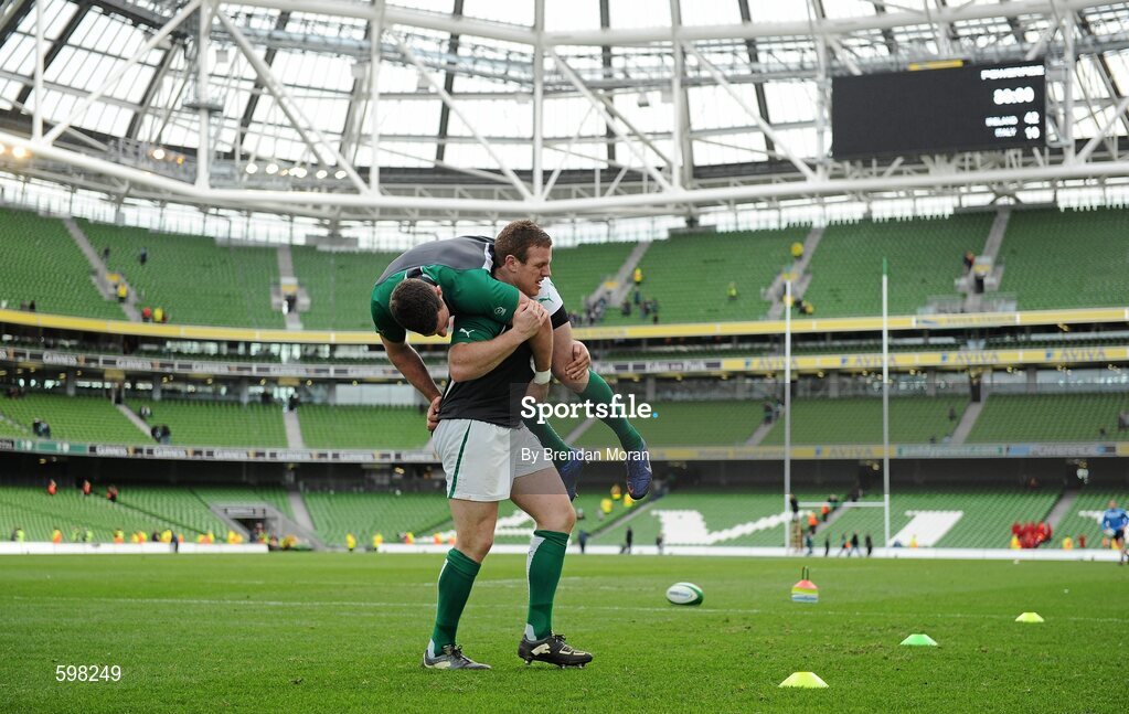 25 February 2012; Ireland's Sean Cronin carries team-mates Fergus McFadden as the substitutes go through their after match warm-down routine. RBS Six Nations Rugby Championship, Ireland v Italy, Aviva Stadium, Lansdowne Road, Dublin. Picture credit: Brendan Moran / SPORTSFILE