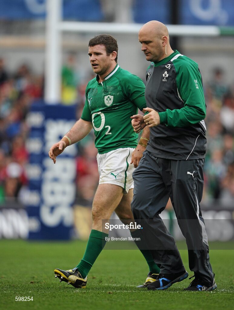 25 February 2012; Ireland's Gordon D'Arcy leaves the pitch during the second half accompanied by team doctor Dr. Eanna Falvey. RBS Six Nations Rugby Championship, Ireland v Italy, Aviva Stadium, Lansdowne Road, Dublin. Picture credit: Brendan Moran / SPORTSFILE