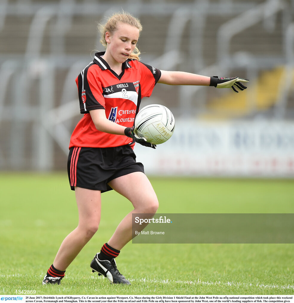 25 June 2017; Deirbhile Lynch of Killygarry, Co. Cavan in action against Westport, Co. Mayo during the Girls Division 1 Shield Final at the John West Peile na nÓg national competition which took place this weekend across Cavan, Fermanagh and Monaghan. This is the second year that the Féile na nGael and Féile Peile na nÓg have been sponsored by John West, one of the world’s leading suppliers of fish. The competition gives up-and-coming GAA superstars the chance to participate and play in their respective Féile tournament, at a level which suits their age, skills and strengths. Photo by Matt Browne/Sportsfile