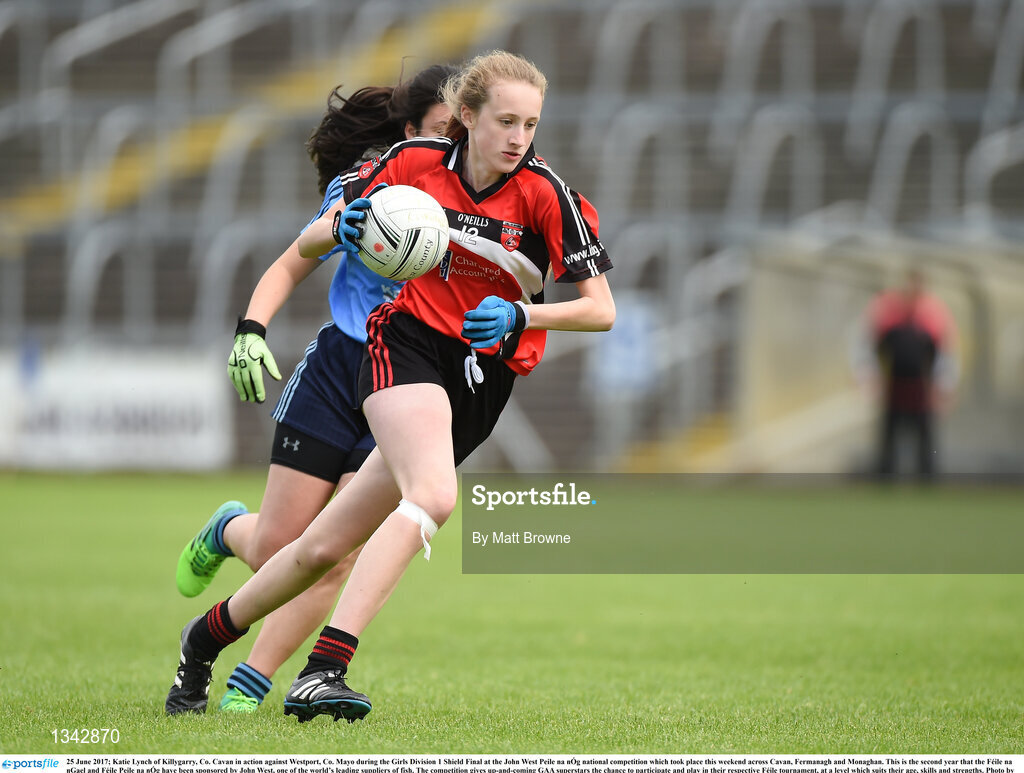 25 June 2017; Katie Lynch of Killygarry, Co. Cavan in action against Westport, Co. Mayo during the Girls Division 1 Shield Final at the John West Peile na nÓg national competition which took place this weekend across Cavan, Fermanagh and Monaghan. This is the second year that the Féile na nGael and Féile Peile na nÓg have been sponsored by John West, one of the world’s leading suppliers of fish. The competition gives up-and-coming GAA superstars the chance to participate and play in their respective Féile tournament, at a level which suits their age, skills and strengths. Photo by Matt Browne/Sportsfile