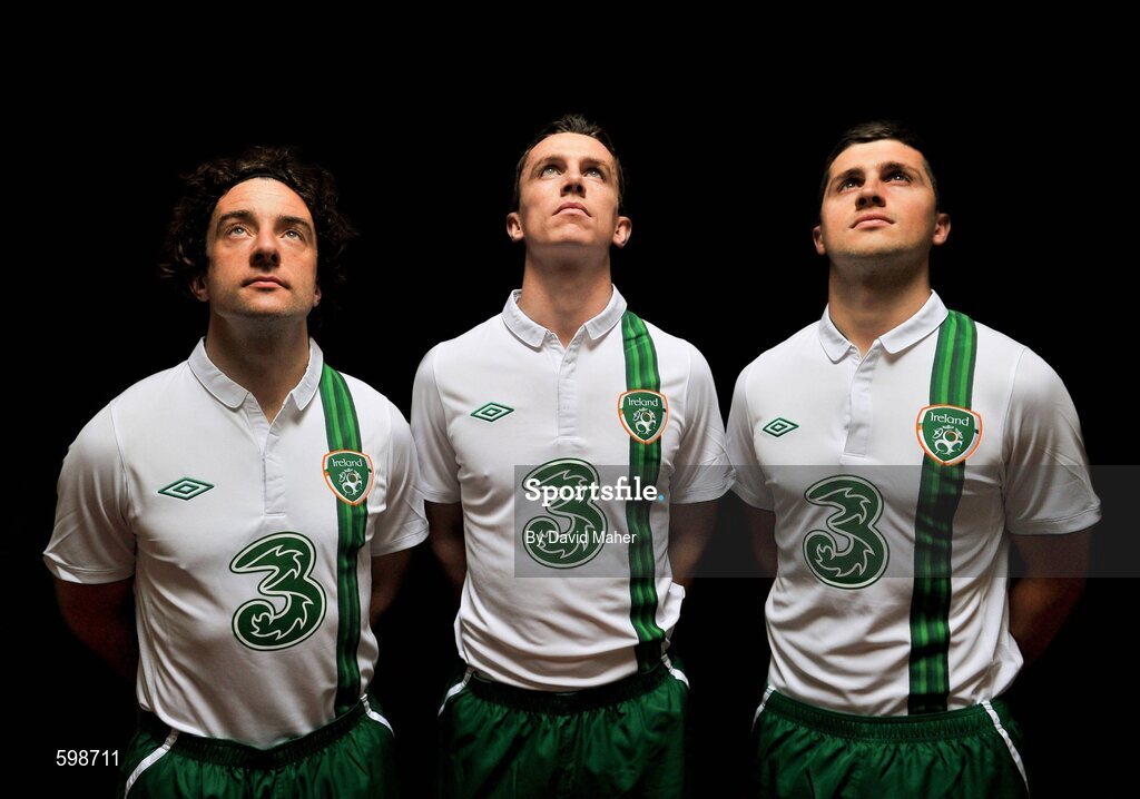 27 February 2012; Three, proud sponsors of the Republic of Ireland football team, today launches the new Umbro Republic of Ireland away jersey. Pictured wearing the new kit are Republic of Ireland players, from left, Stephen Hunt, Kevin Foley, and Shane Long. The Three sponsored jersey is available now and will be worn for the first time on the pitch for the Republic of Ireland’s Euro 2012 warm up friendly match against the Czech Republic on Wednesday 29th February. To celebrate the launch, Three is giving away 8 pairs of tickets to the match, just go to www.facebook.com/3Football for more details, terms and conditions and apply. Gannon Park, Malahide, Co. Dublin. Picture credit: David Maher / SPORTSFILE