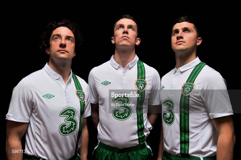 27 February 2012; Three, proud sponsors of the Republic of Ireland football team, today launches the new Umbro Republic of Ireland away jersey. Pictured wearing the new kit are Republic of Ireland players, from left, Stephen Hunt, Kevin Foley, and Shane Long. The Three sponsored jersey is available now and will be worn for the first time on the pitch for the Republic of Ireland’s Euro 2012 warm up friendly match against the Czech Republic on Wednesday 29th February. To celebrate the launch, Three is giving away 8 pairs of tickets to the match, just go to www.facebook.com/3Football for more details, terms and conditions and apply. Gannon Park, Malahide, Co. Dublin. Picture credit: David Maher / SPORTSFILE