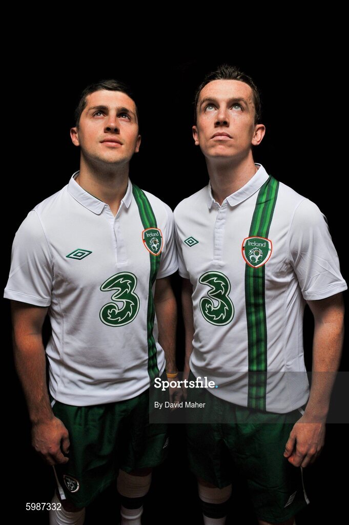 27 February 2012; Three, proud sponsors of the Republic of Ireland football team, today launches the new Umbro Republic of Ireland away jersey. Pictured wearing the new kit are Republic of Ireland players are Shane Long, left, and Kevin Foley. The Three sponsored jersey is available now and will be worn for the first time on the pitch for the Republic of Ireland’s Euro 2012 warm up friendly match against the Czech Republic on Wednesday 29th February. To celebrate the launch, Three is giving away 8 pairs of tickets to the match, just go to www.facebook.com/3Football for more details, terms and conditions and apply. Gannon Park, Malahide, Co. Dublin. Picture credit: David Maher / SPORTSFILE