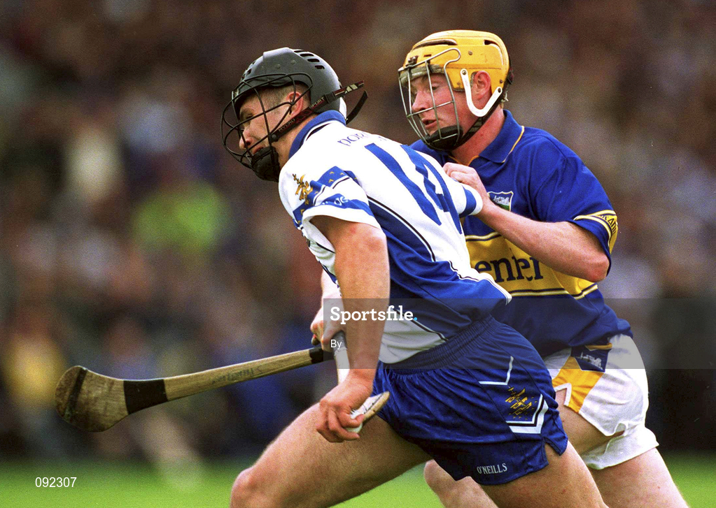 30 June 2002; Seamus Prendergast, Waterford, in action against Eamonn Corcoran, Tipperary. Waterford v Tipperary, Guinness Munster Hurling Final, Pairc Ui Chaoimh, Cork. Picture credit; Brendan Moran / SPORTSFILE