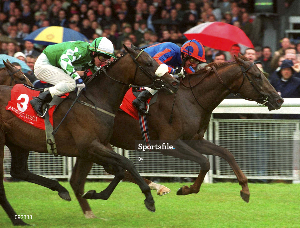30 June 2002; Hold That Tiger, with Mick Kinane up, races clear of Pakhoes, with Pat Smullen up, on his way to winning The Anheuser Busch Railway Stakes, Curragh Racecourse, Co. Kildare, Horse Racing. Picture credit; Brian Lawless / SPORTSFILE