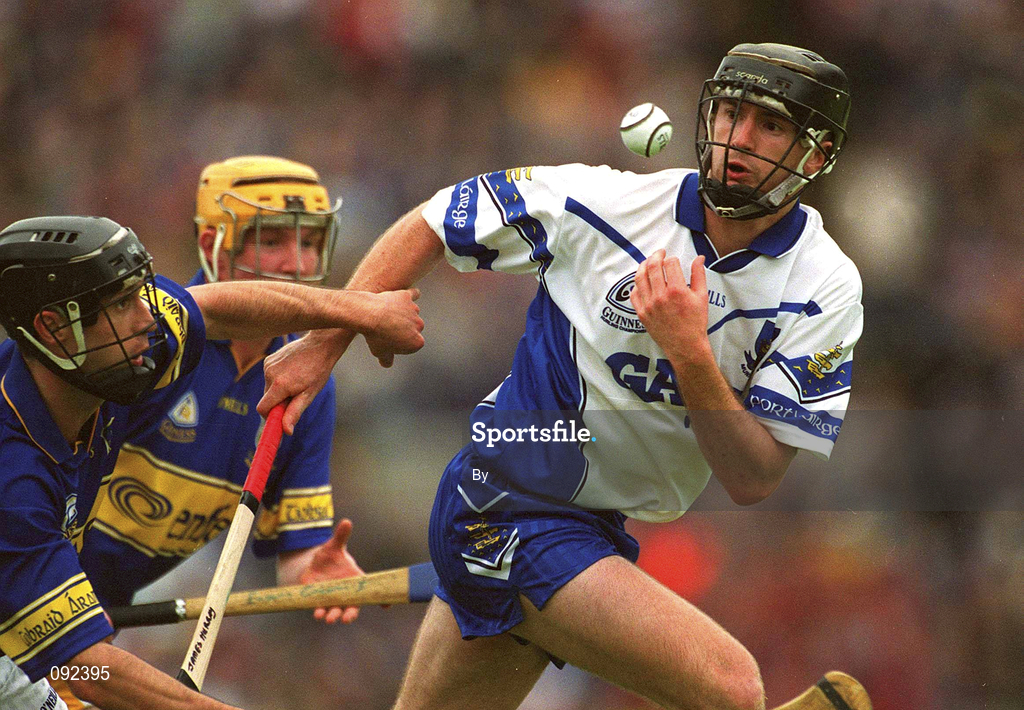 30 June 2002; James Murray, Waterford, in action against Thomas Dunne, Tipperary. Waterford v Tipperary, Guinness Munster Hurling Final, Pairc Ui Chaoimh, Cork. Picture credit; Ray McManus / SPORTSFILE