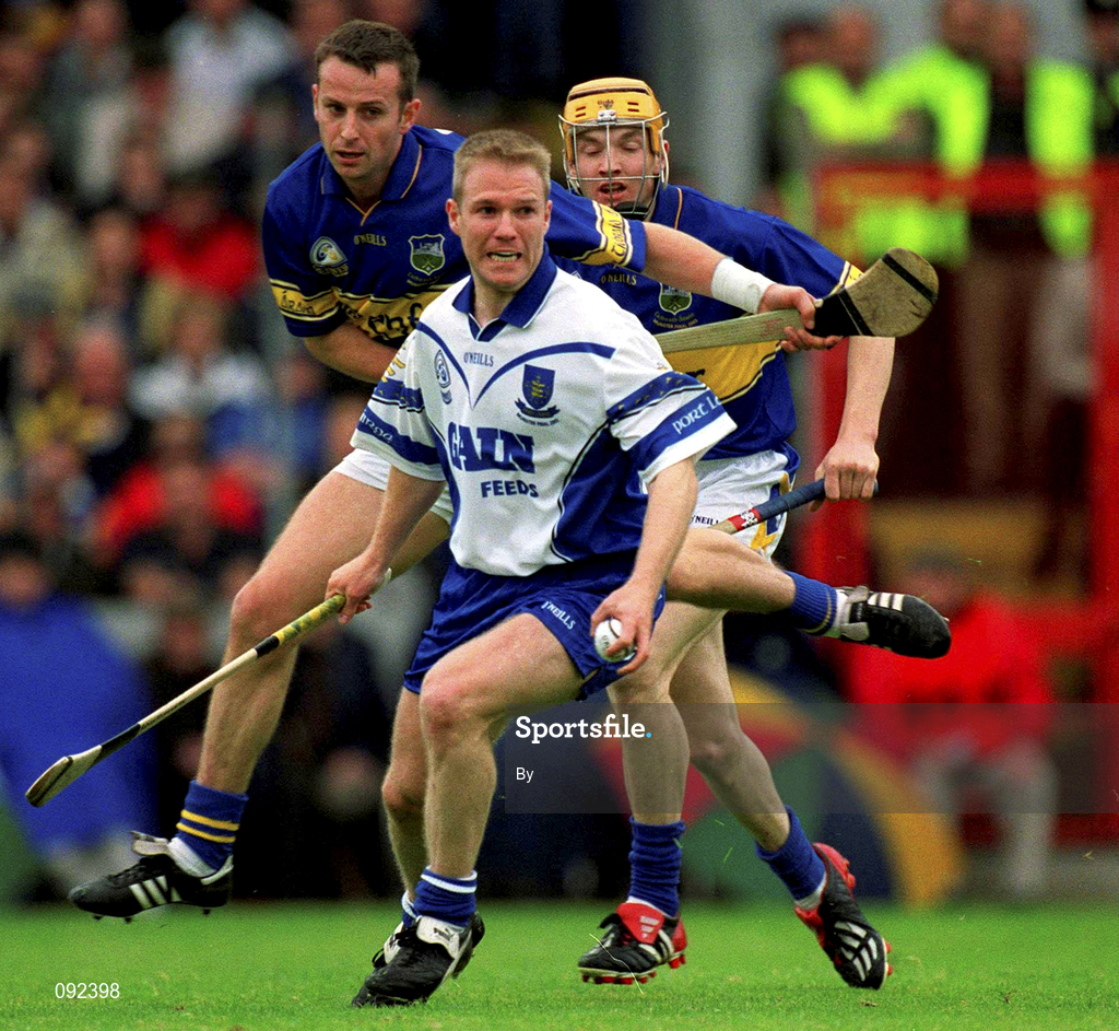 30 June 2002; Brian Flannery, Waterford, in action against Tipperary's Lar Corbett and Brian O'Meara, left. Waterford v Tipperary, Guinness Munster Hurling Final, Pairc Ui Chaoimh, Cork. Picture credit; Ray McManus / SPORTSFILE