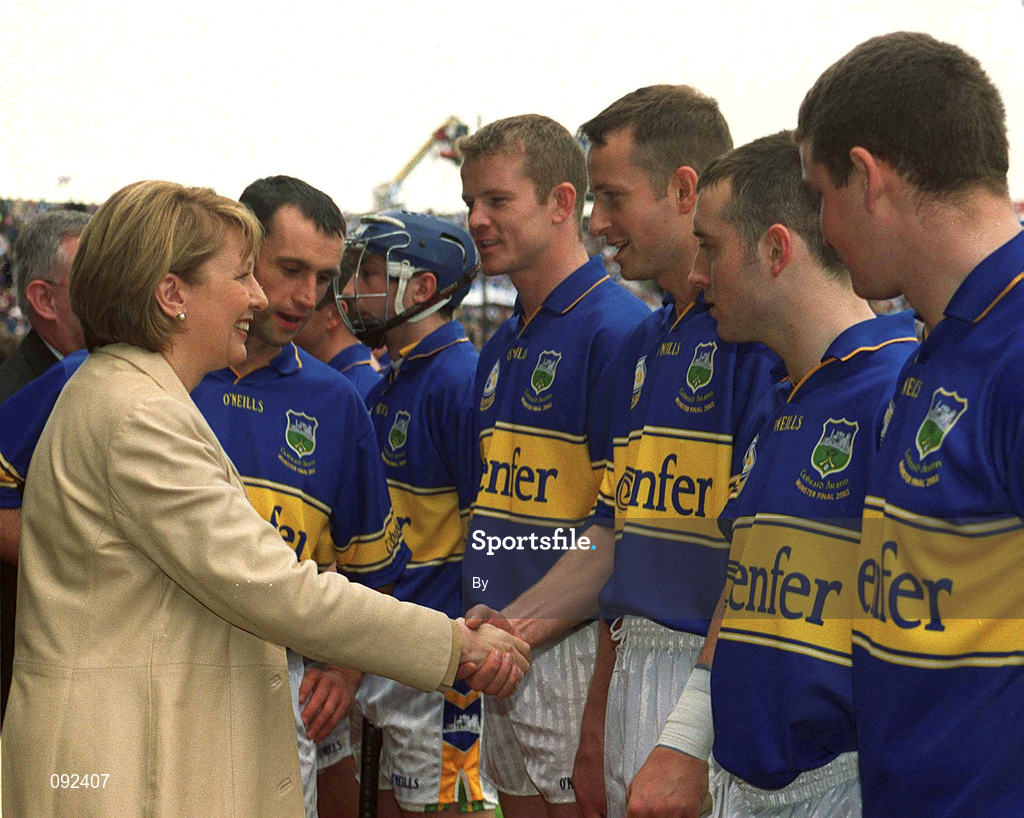 30 June 2002; President Mary McAleese is introduced to Tipperary's Brian O'Meara by team captain Thomas Dunne. Waterford v Tipperary, Guinness Munster Hurling Final, Pairc Ui Chaoimh, Cork. Picture credit; Ray McManus / SPORTSFILE