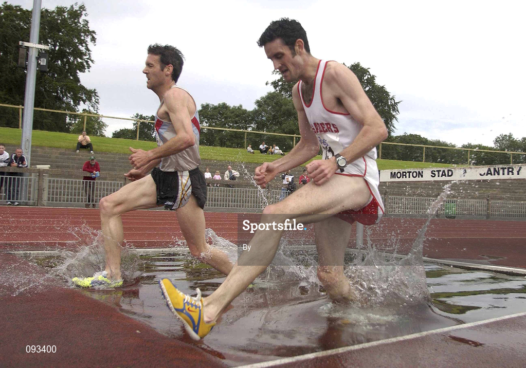 13 July 2002; Eventual winner Eugene O'Neill, Crusaders AC (nearest camera), and defending champion Cormac Smyth, Dundrum South Dublin AC, clear the water jump during the Men's 300m Steeplechase Final. AAI National Track and Field Championships, Morton Stadium, Santry, Dublin. Athletics. Picture credit; Brendan Moran / SPORTSFILE *EDI*