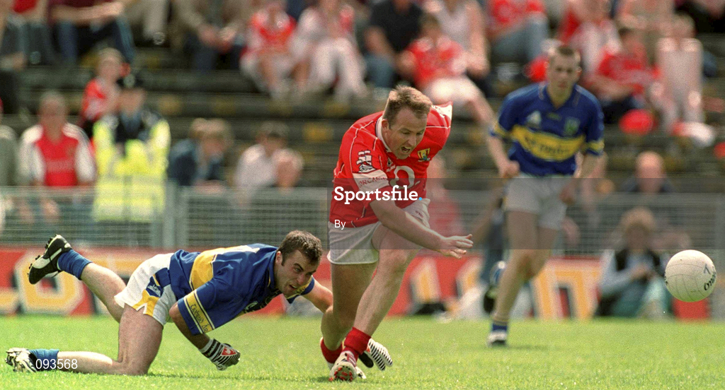 14 July 2002; Colin Corkery, Cork, in action against Damien Byrne, Tipperary. Bank of Ireland Munster Football Final, Cork v Tipperary, Semple Stadium, Thurles, Co. Tipperary. Picture credit; Brendan Moran / SPORTSFILE