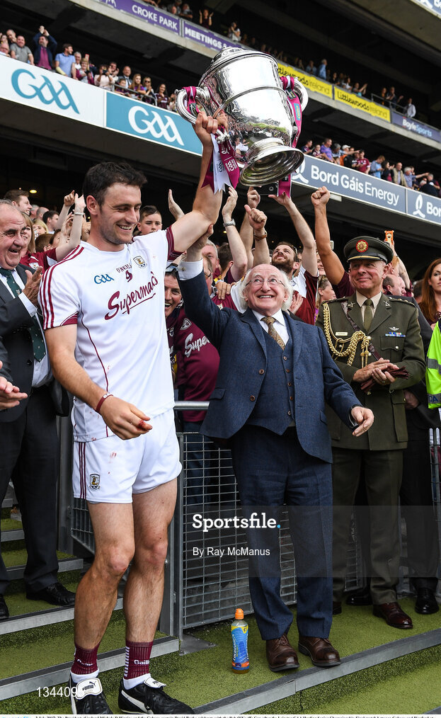 2 July 2017; The President of ireland Michael D Higgins and the Galway captain David Burke celebrate with the Bob O'Keeffe Cup after the Leinster GAA Hurling Senior Championship Final match between Galway and Wexford at Croke Park in Dublin. Photo by Ray McManus/Sportsfile