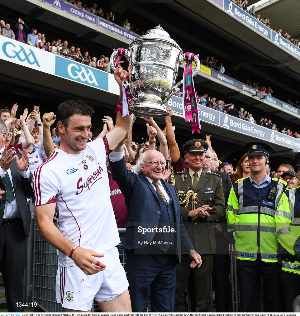 2 July 2017; The President of ireland Michael D Higgins and the Galway captain David Burke celebrate with the Bob O'Keeffe Cup after the Leinster GAA Hurling Senior Championship Final match between Galway and Wexford at Croke Park in Dublin. Photo by Ray McManus/Sportsfile