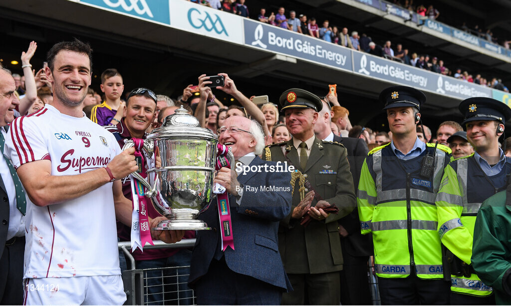 2 July 2017; The President of Ireland Michael D Higgins and the Galway captain David Burke celebrate with the Bob O'Keeffe Cup after the Leinster GAA Hurling Senior Championship Final match between Galway and Wexford at Croke Park in Dublin. Photo by Ray McManus/Sportsfile