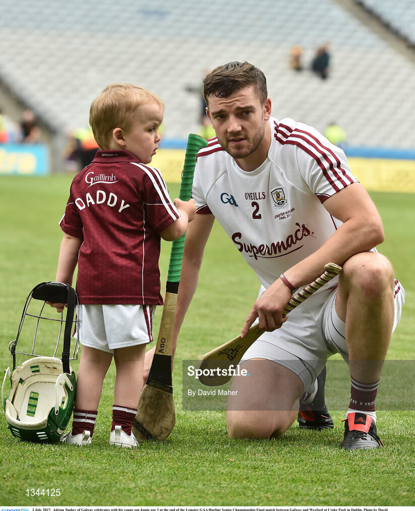 2 July 2017;  Adrian Tuohey of Galway celebrates with his young son Jamie age 3 at the end of the Leinster GAA Hurling Senior Championship Final match between Galway and Wexford at Croke Park in Dublin. Photo by David Maher/Sportsfile