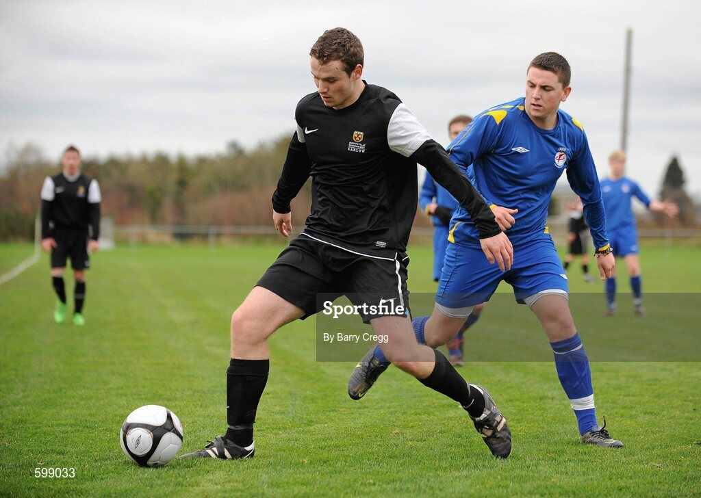 28 February 2012; Bobby Tier, IT Carlow 'C', in action against Garteh Toal, Drogheda Institute of FE. Umbro CUFL Division Two Final, Drogheda Institute of FE v IT Carlow 'C', Greenogue, Peamount United FC, Peamount, Dublin. Picture credit: Barry Cregg / SPORTSFILE