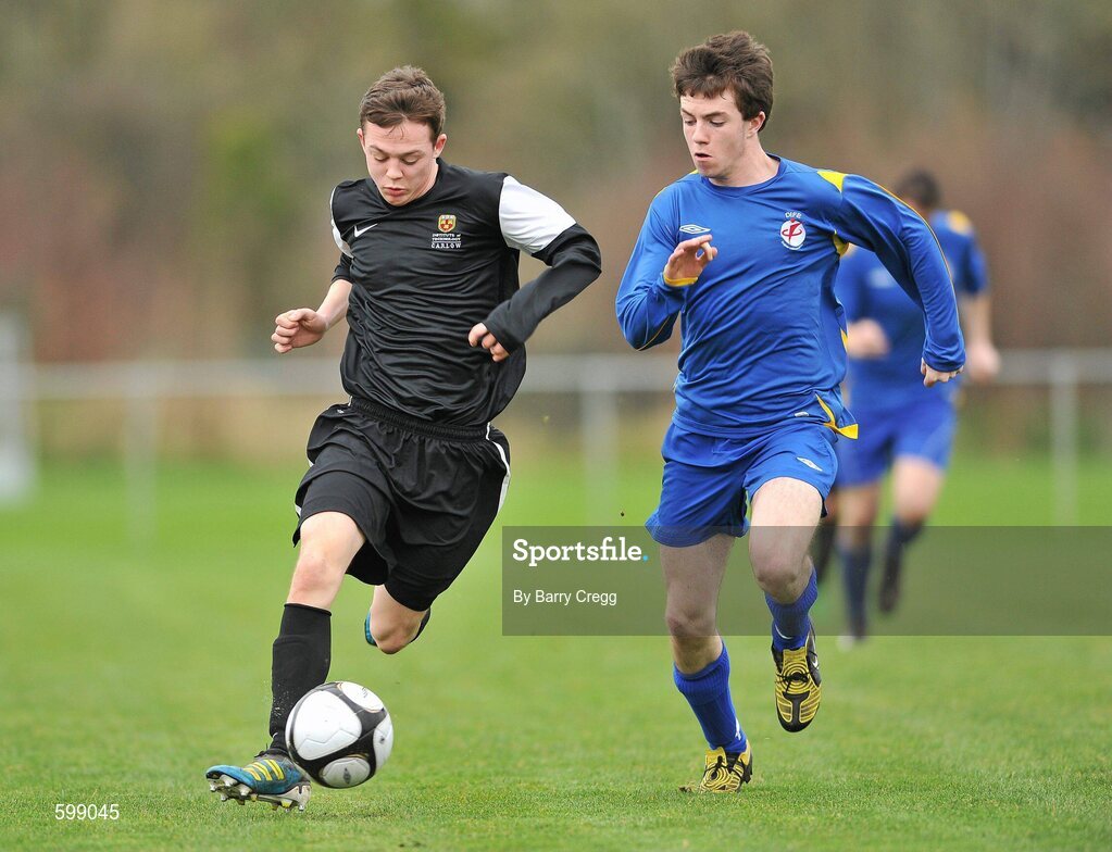 28 February 2012; DJ Flynn, IT Carlow 'C', in action against Stephen Kilcoyne, Drogheda Institute of FE. Umbro CUFL Division Two Final, Drogheda Institute of FE v IT Carlow 'C', Greenogue, Peamount United FC, Peamount, Dublin. Picture credit: Barry Cregg / SPORTSFILE