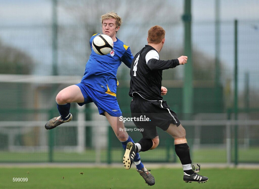 28 February 2012; Cormac Renaghan, Drogheda Institute of FE, in action against Gary Seery, IT Carlow 'C'. Umbro CUFL Division Two Final, Drogheda Institute of FE v IT Carlow 'C', Greenogue, Peamount United FC, Peamount, Dublin. Picture credit: Barry Cregg / SPORTSFILE