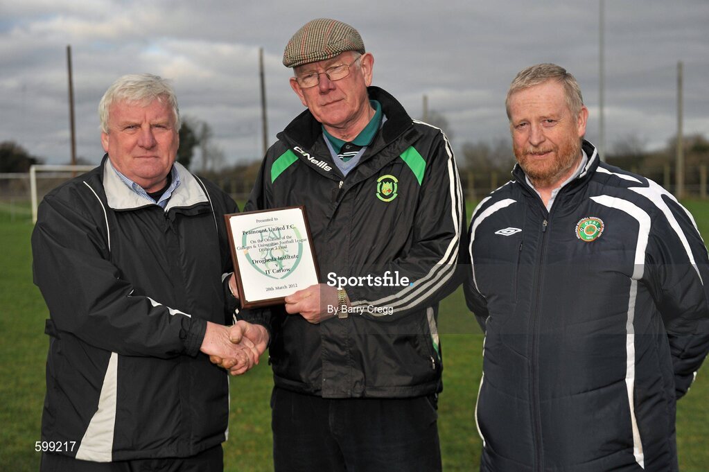 28 February 2012; Denis Cummins, Peamount Utd, receives a plaque from IUFU Chairman Terry McAuley, left, and CFAI Chairman Padraig Carney, right,for the use of their grounds for the game. Umbro CUFL Division Two Final, Drogheda Institute of FE v IT Carlow 'C', Greenogue, Peamount United FC, Peamount, Dublin. Picture credit: Barry Cregg / SPORTSFILE