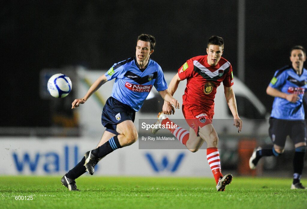2 March 2012; Robert Benson, UCD, in action against Gearoid Morrissey, Cork City. Airtricity League Premier Division, UCD v Cork City, Belfield Bowl, UCD, Belfield, Dublin. Picture credit: Ray McManus / SPORTSFILE