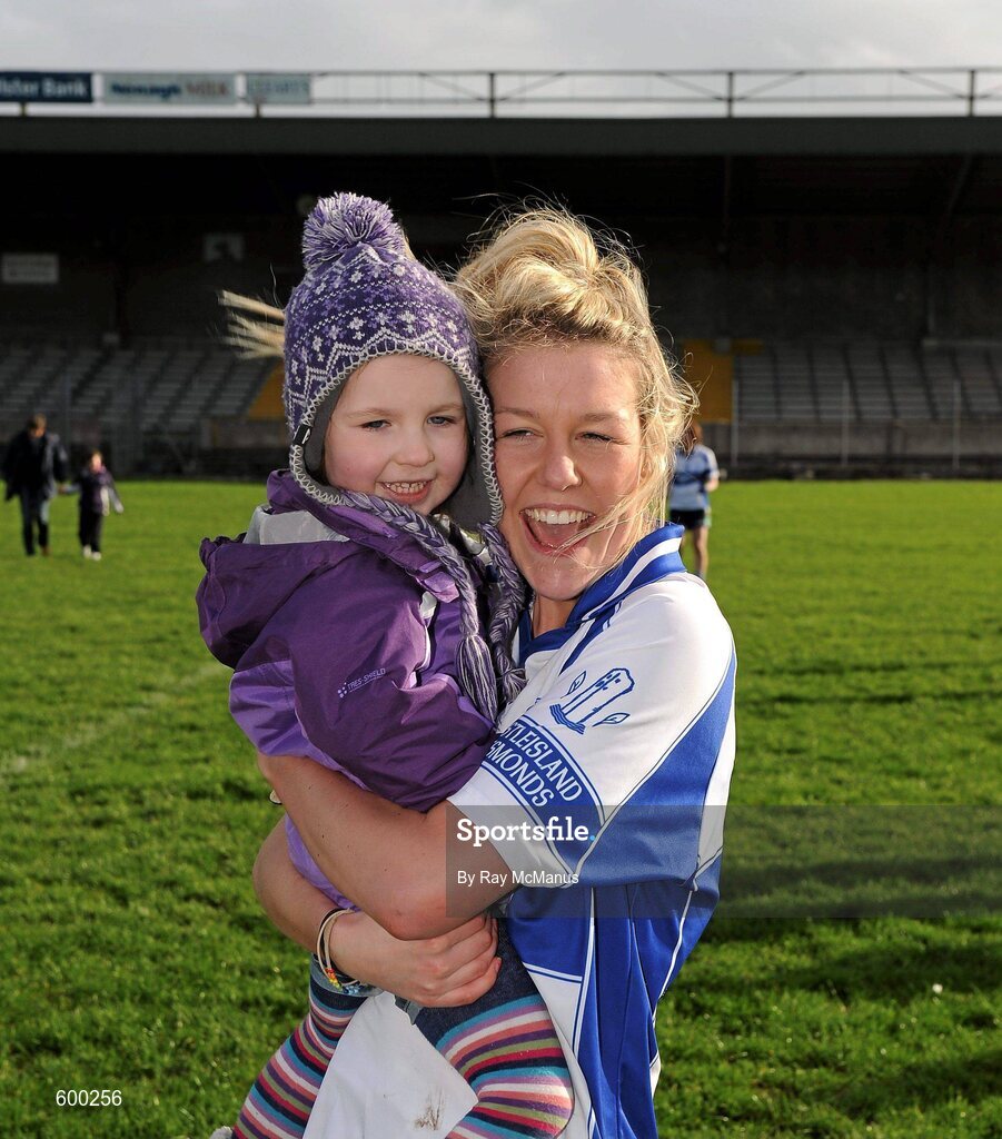 3 March 2012; Three year old Colaiste Ide agus Iosef supporter Emma Collins, from Upper Athea, Limerick, celebrates with corner forward Tara Zgaga after the game. Tesco All-Ireland Post Primary Schools Senior A Semi-Final, St Leo’s, Carlow v Colaiste Ide agus Iosef, Limerick, McDonagh Park, Nenagh, Co. Tipperary. Picture credit: Ray McManus / SPORTSFILE