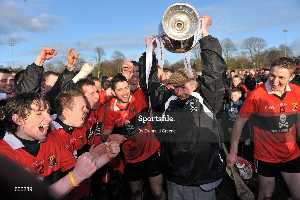 3 March 2012; UCC logistics manager Jim Roche lifts the cup alongside players after victory over CIT. Irish Daily Mail Fitzgibbon Cup Final, University College Cork v Cork Institute of Technology, Mardyke Arena, Cork. Picture credit: Diarmuid Greene / SPORTSFILE