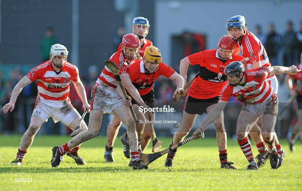 3 March 2012; Seamus Corry, left, and Shane Bourke, UCC, in action against Lorcan McLoughlin, left, and Stephen White, CIT. Irish Daily Mail Fitzgibbon Cup Final, University College Cork v Cork Institute of Technology, Mardyke Arena, Cork. Picture credit: Diarmuid Greene / SPORTSFILE