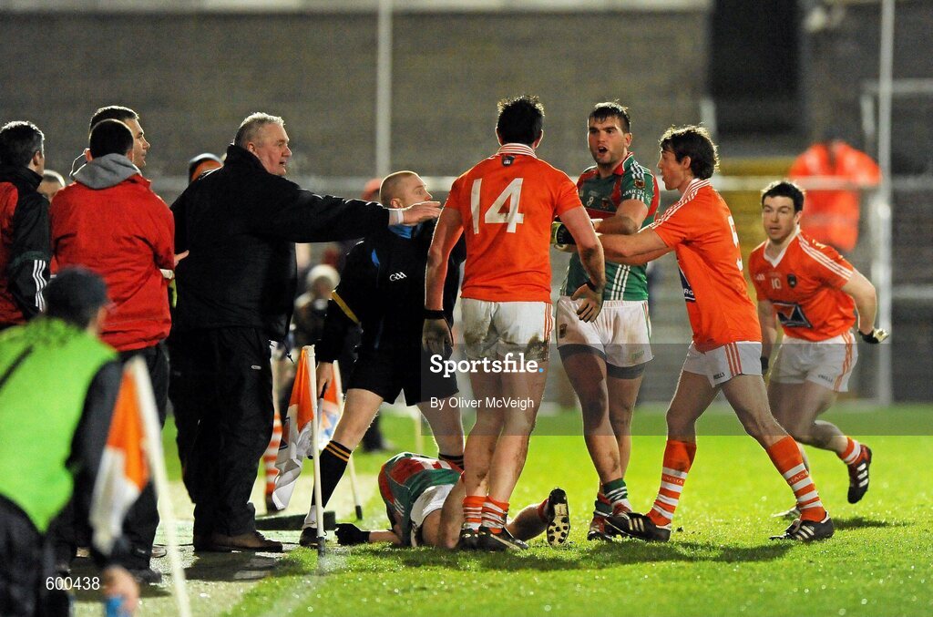 3 March 2012; John Kingham, Armagh, and Aidan O'Shea, Mayo, in dispute as Alan Dillon, Mayo, lies on the ground. Allianz Football League, Division 1, Armagh v Mayo, Morgan Athletic Grounds, Armagh. Picture credit: Oliver McVeigh / SPORTSFILE