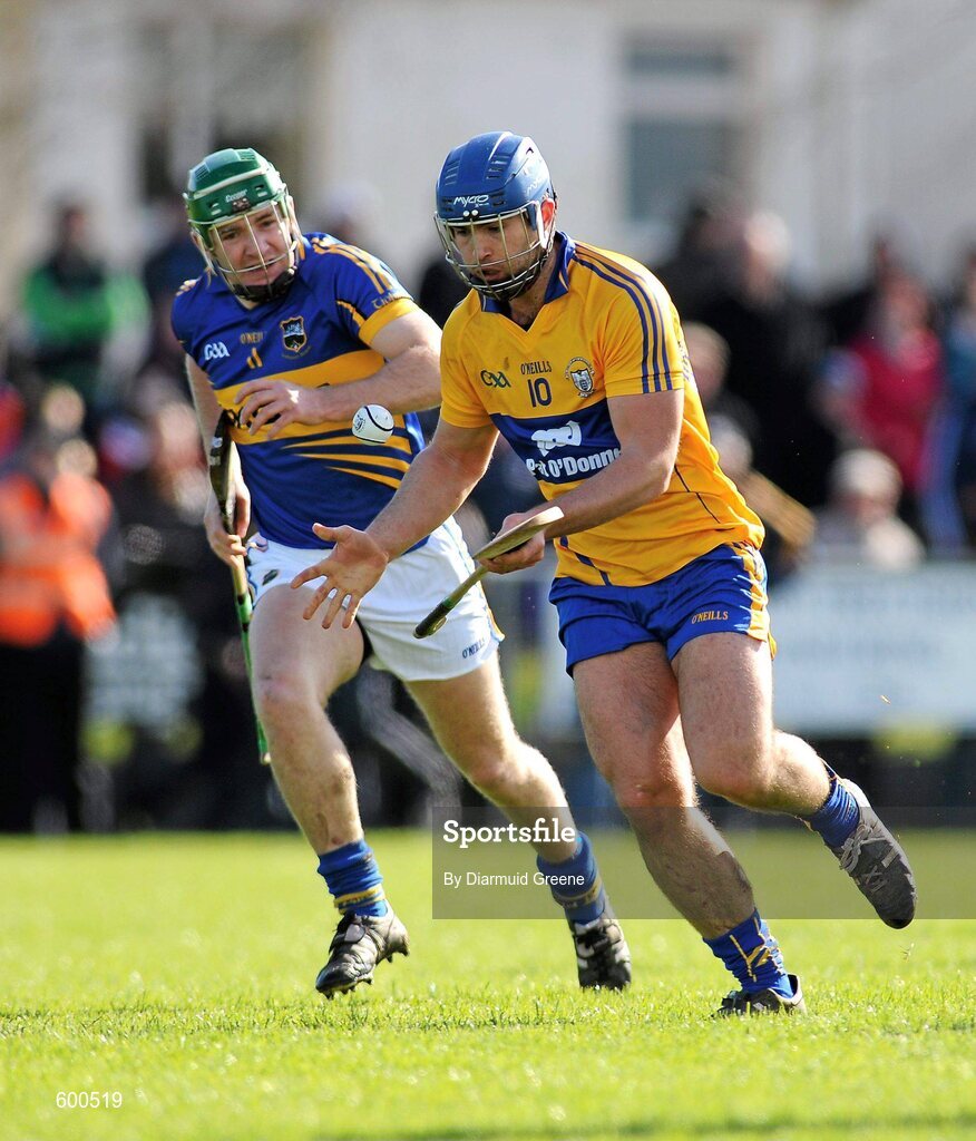 4 March 2012; Camin Morey, Clare, in action against Noel McGrath, Tipperary. Waterford Crystal Cup Hurling Final, Clare v Tipperary, O'Garney Park, Sixmilebridge, Co. Clare. Picture credit: Diarmuid Greene / SPORTSFILE