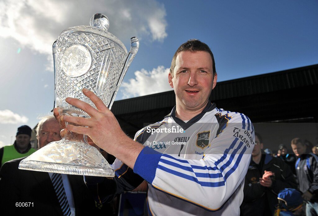 4 March 2012; Tipperary captain Brendan Cummins lifts the cup after victory over Clare. Waterford Crystal Cup Hurling Final, Clare v Tipperary, O'Garney Park, Sixmilebridge, Co. Clare. Picture credit: Diarmuid Greene / SPORTSFILE