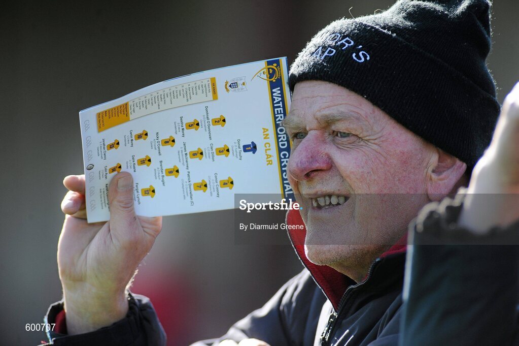 4 March 2012; Clare supporter, Tom Lynch, from Kilkishen, Co. Clare, uses his programme to shield his eyes from the sun during the game. Waterford Crystal Cup Hurling Final, Clare v Tipperary, O'Garney Park, Sixmilebridge, Co. Clare. Picture credit: Diarmuid Greene / SPORTSFILE