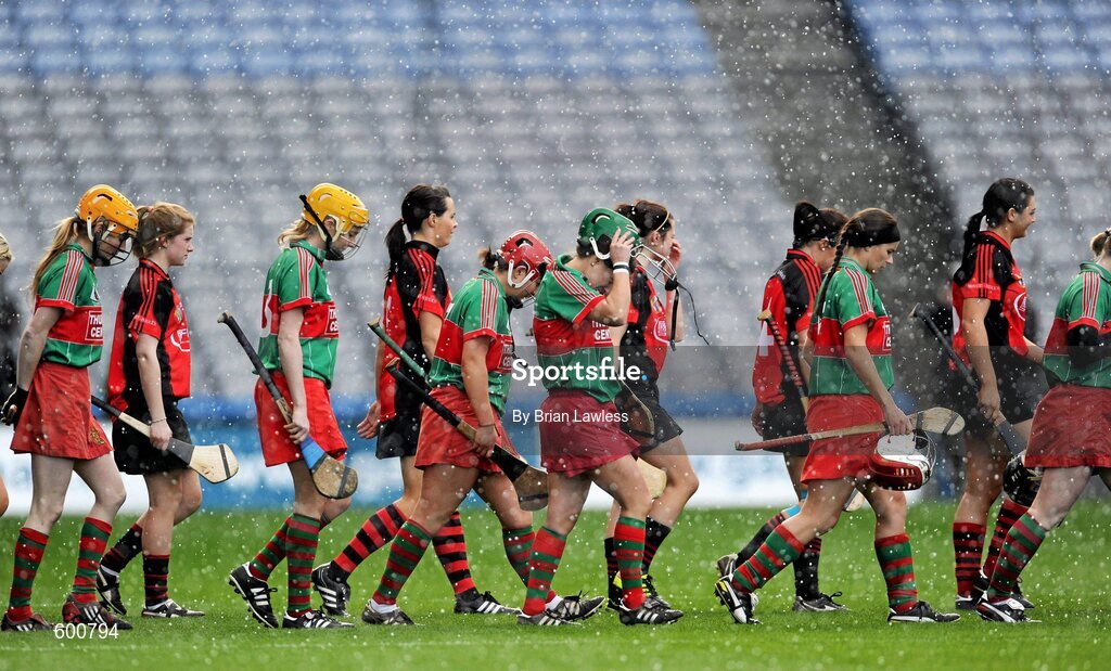 4 March 2012; The two teams parade during a heavy hail shower. All Ireland Senior Camogie Club Championship Final 2011, Drom/Inch, Tipperary v Oulart-the-Ballagh, Wexford, Croke Park, Dublin. Picture credit: Brian Lawless / SPORTSFILE