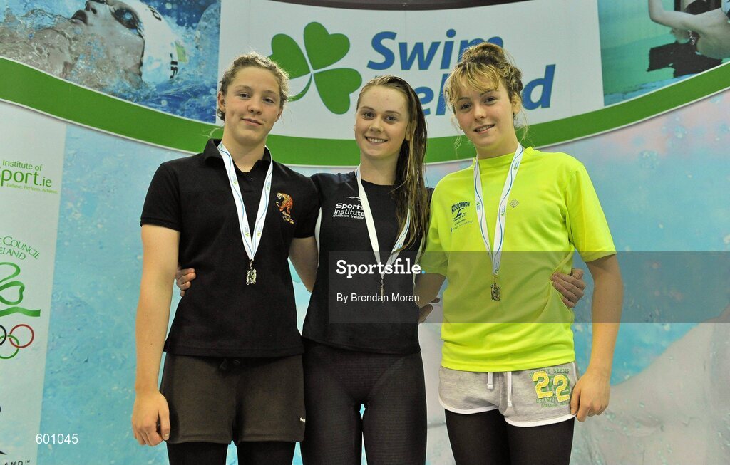 2 March 2012; Medallists in the Women's 100m breaststroke, from left, Shani Stallard, silver, Kilkenny SC, Sycerika McMahon, gold, Leander SC, and Saoirse McGrath, bronze, Galway, during the Irish Long Course National Swimming Championships/Olympic Trials. National Aquatic Centre, Abbotstown, Dublin. Picture credit: Brendan Moran / SPORTSFILE