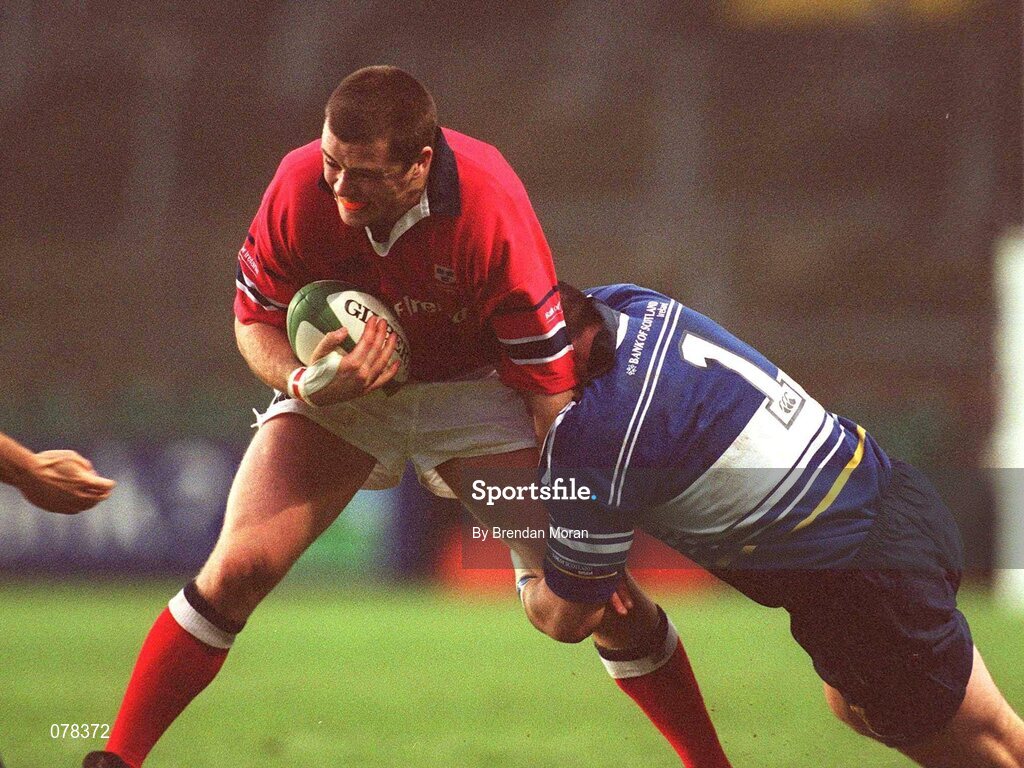 15 December 2001; Munster's Marcus Horan is tackled by Leinster's Reggie Corrigan. Leinster v Munster, Celtic League, Final, Lansdowne Road, Dublin. Rugby. Picture credit; Brendan Moran / SPORTSFILE