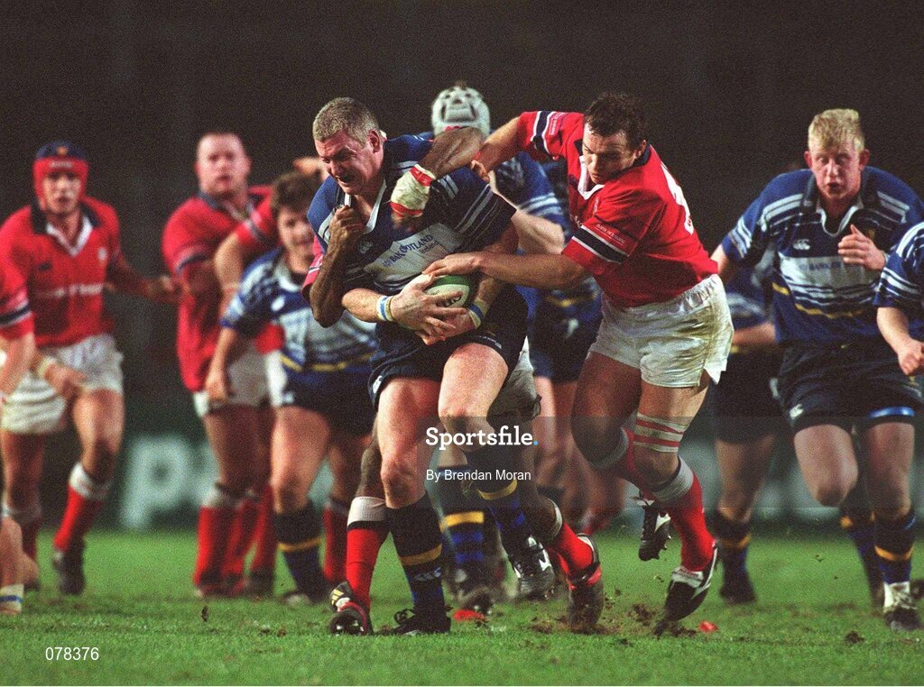 15 December 2001; Leinster's Victor Costello is tackled by Munster's Rob Henderson. Leinster v Munster, Celtic League, Final, Lansdowne Road, Dublin. Rugby. Picture credit; Brendan Moran / SPORTSFILE