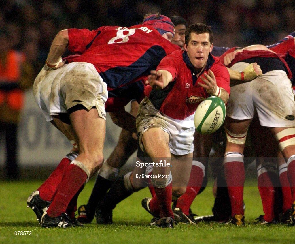 1 December 2001; Guy Easterby, Llanelli makes a pass to his backs, watched by brother Simon (8). Munster v Llanelli, Celtic League quarter-final, Thomond Park, Limerick. Rugby. Picture credit; Brendan Moran / SPORTSFILE