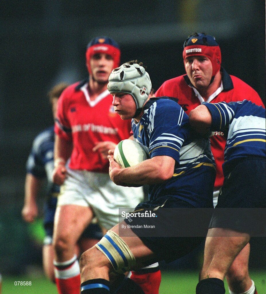15 December 2001; Malcolm O'Kelly, Leinster, is tackled by Anthony Foley, Munster. Leinster v Munster, Celtic League, Final, Lansdowne Road, Dublin. Rugby. Picture credit; Brendan Moran / SPORTSFILE