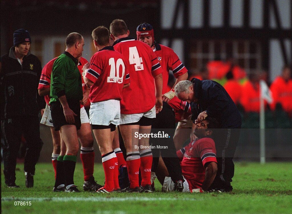 15 December 2001; Munster's Jim Williams is attended to by the team doctor. Leinster v Munster, Celtic League Final, Lansdowne, Dublin. Rugby. Picture credit; Brendan Moran / SPORTSFILE