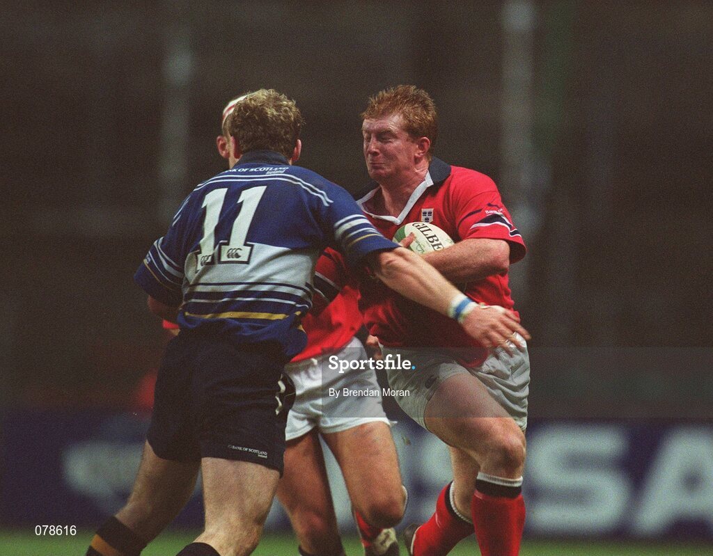 15 December 2001; Munster's Anthony Horgan is tackled by Gordon, Leinster. Leinster v Munster, Celtic League Final, Lansdowne, Dublin. Rugby. Picture credit; Brendan Moran / SPORTSFILE