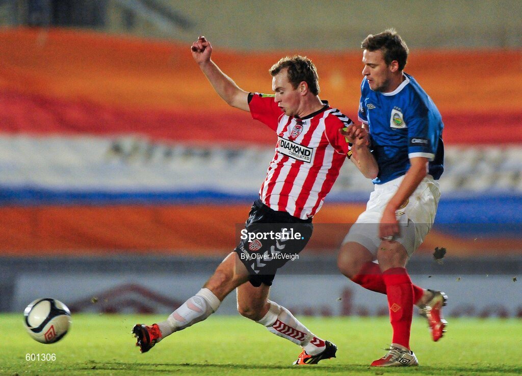 5 March 2012; Simon Madden, Derry City, in action against Peter Thompson, Linfield. 2012 Setanta Sports Cup, Quarter-Final, 1st Leg, Linfield v Derry City, Windsor Park, Belfast, Co. Antrim. Picture credit: Oliver McVeigh / SPORTSFILE