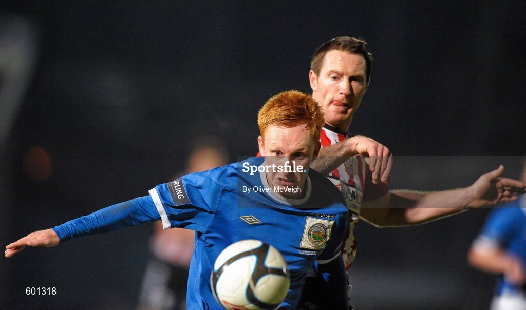 5 March 2012; Robert Garrett, Linfield, in action against Barry Molloy, Derry City. 2012 Setanta Sports Cup, Quarter-Final, 1st Leg, Linfield v Derry City, Windsor Park, Belfast, Co. Antrim. Picture credit: Oliver McVeigh / SPORTSFILE