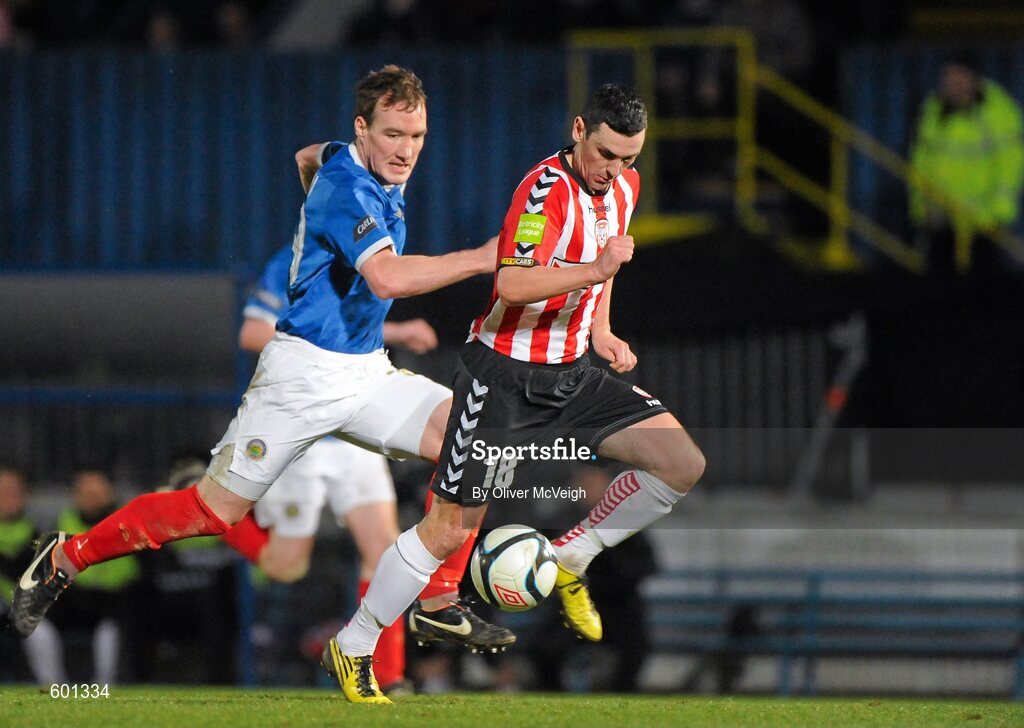 5 March 2012; Mark Farren, Derry City, in action against Albert Watson, Linfield. 2012 Setanta Sports Cup, Quarter-Final, 1st Leg, Linfield v Derry City, Windsor Park, Belfast, Co. Antrim. Picture credit: Oliver McVeigh / SPORTSFILE