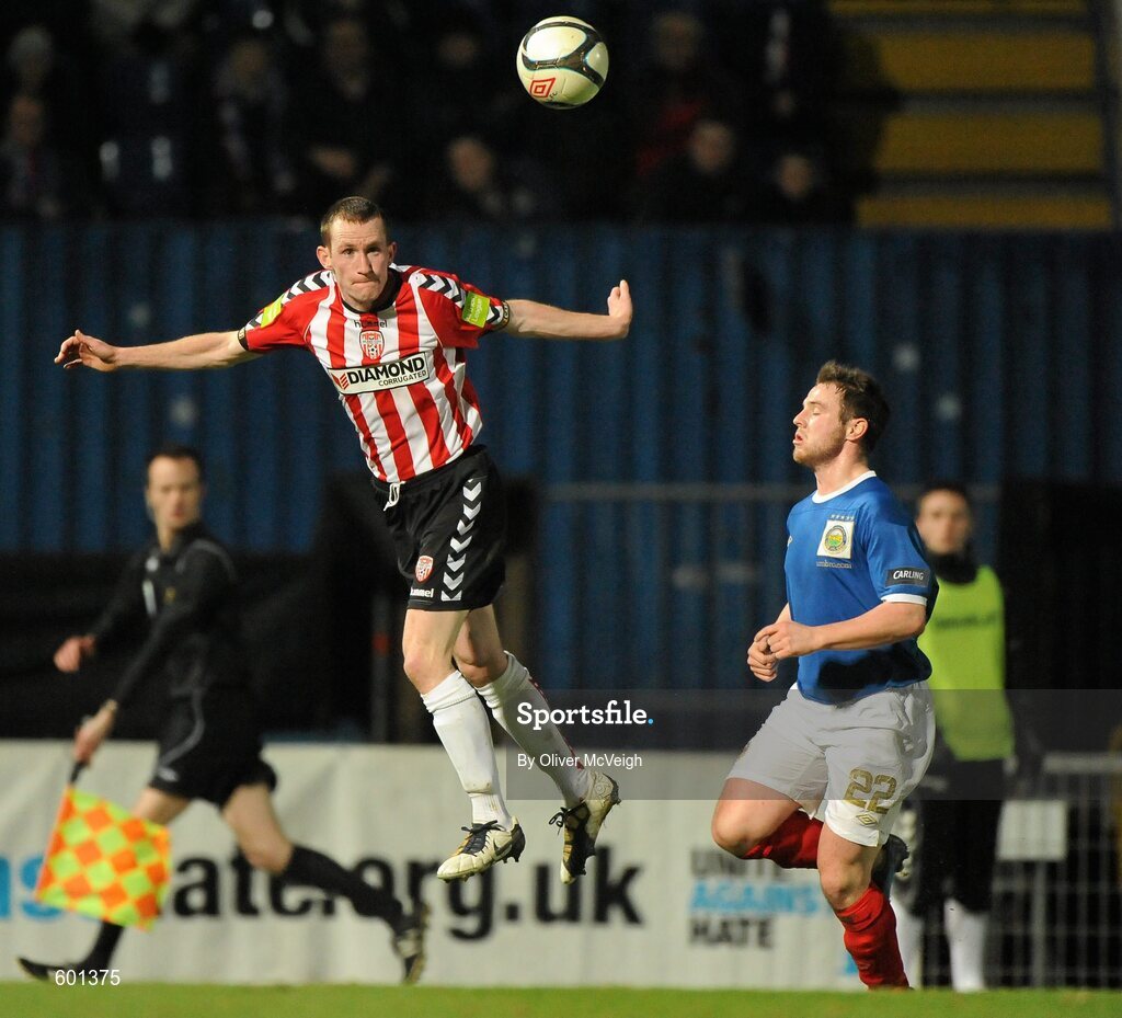 5 March 2012; Dermot McCaffery, Derry City, in action against Jamie Mulgrew, Linfield. 2012 Setanta Sports Cup, Quarter-Final, 1st Leg, Linfield v Derry City, Windsor Park, Belfast, Co. Antrim. Picture credit: Oliver McVeigh / SPORTSFILE