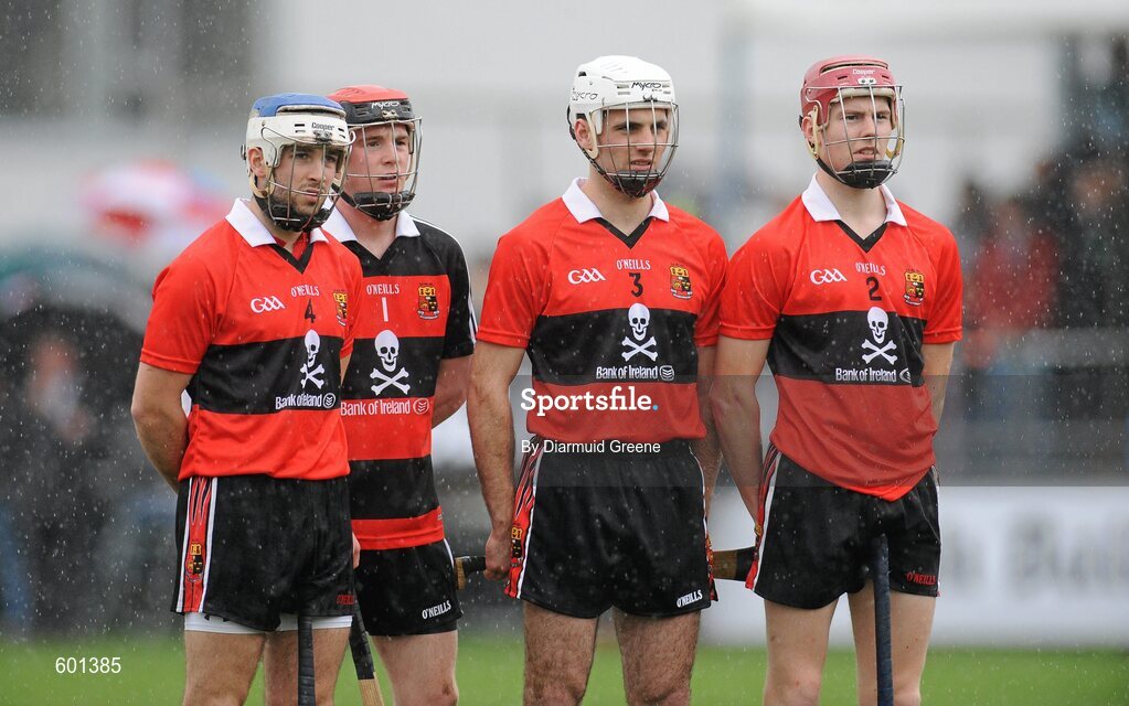 3 March 2012; UCC players, from left to right, Killian Murphy, Darren McCarthy, John O'Callaghan and Stephen Maher during the playing of the National Anthem. Irish Daily Mail Fitzgibbon Cup Final, University College Cork v Cork Institute of Technology, Mardyke Arena, Cork. Picture credit: Diarmuid Greene / SPORTSFILE