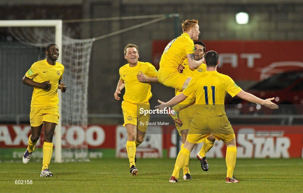 9 March 2012; Willo McDonagh, second from right, Monaghan United, celebrates after scoring his side's first goal with team-mates, left to right, Michael Isichei, Anthony Griffiths, Keith Quinn and no.11 Darragh Reynor. Airtricity League Premier Division, Shamrock Rovers v Monaghan United, Tallaght Stadium, Tallaght, Dublin. Picture credit: David Maher / SPORTSFILE