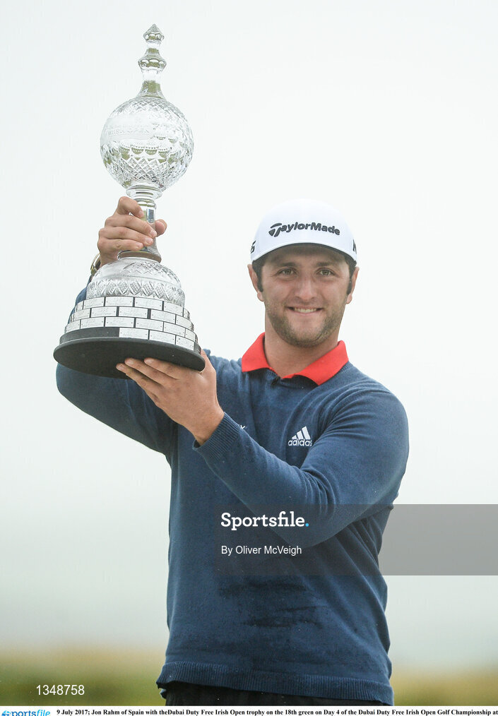 9 July 2017; Jon Rahm of Spain with theDubai Duty Free Irish Open trophy on the 18th green on Day 4 of the Dubai Duty Free Irish Open Golf Championship at Portstewart Golf Club in Portstewart, Co Derry. Photo by Oliver McVeigh/Sportsfile
