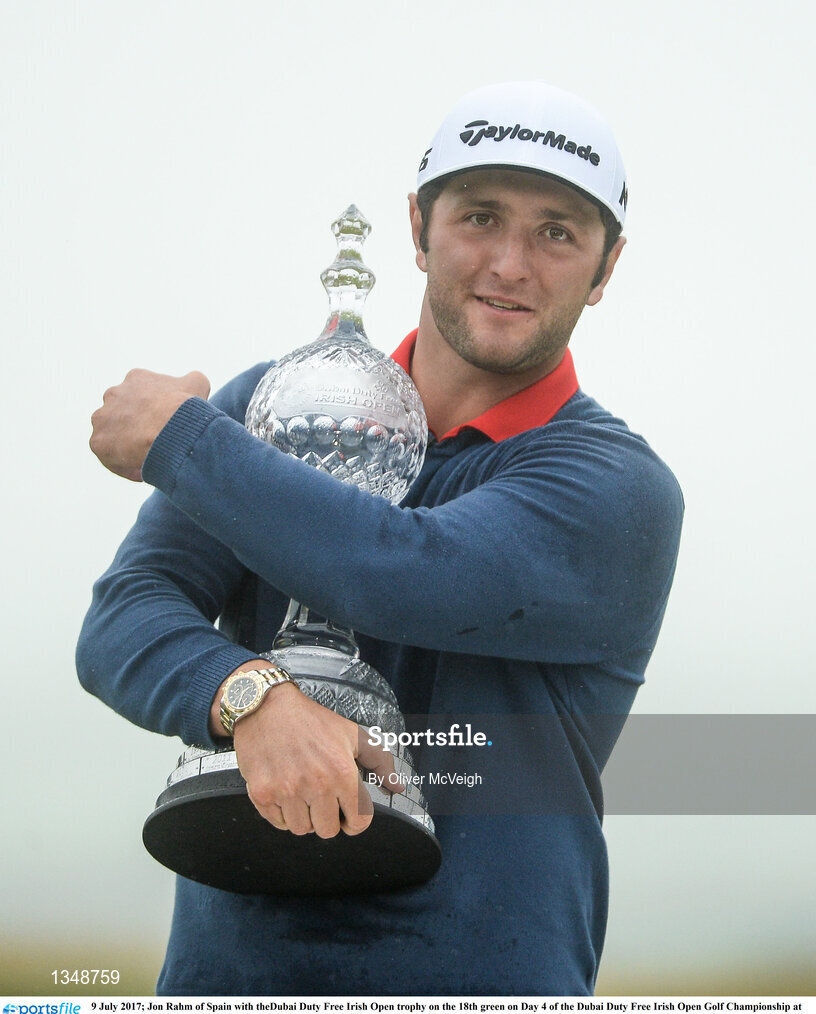9 July 2017; Jon Rahm of Spain with theDubai Duty Free Irish Open trophy on the 18th green on Day 4 of the Dubai Duty Free Irish Open Golf Championship at Portstewart Golf Club in Portstewart, Co Derry. Photo by Oliver McVeigh/Sportsfile