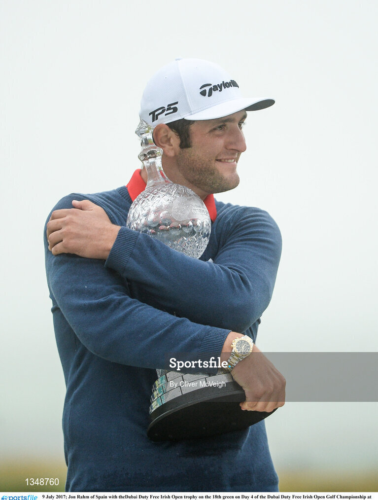 9 July 2017; Jon Rahm of Spain with theDubai Duty Free Irish Open trophy on the 18th green on Day 4 of the Dubai Duty Free Irish Open Golf Championship at Portstewart Golf Club in Portstewart, Co Derry. Photo by Oliver McVeigh/Sportsfile