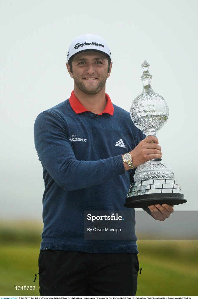 9 July 2017; Jon Rahm of Spain with theDubai Duty Free Irish Open trophy on the 18th green on Day 4 of the Dubai Duty Free Irish Open Golf Championship at Portstewart Golf Club in Portstewart, Co Derry. Photo by Oliver McVeigh/Sportsfile